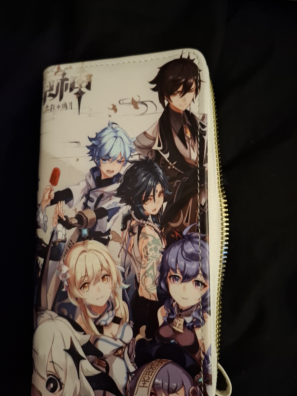 zippered wallet Genshin Impact, showcasing Zhongli, Xiao, and Lumine.